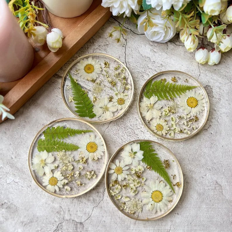 Handmade daisy coaster with pressed flowers and fern leaves
